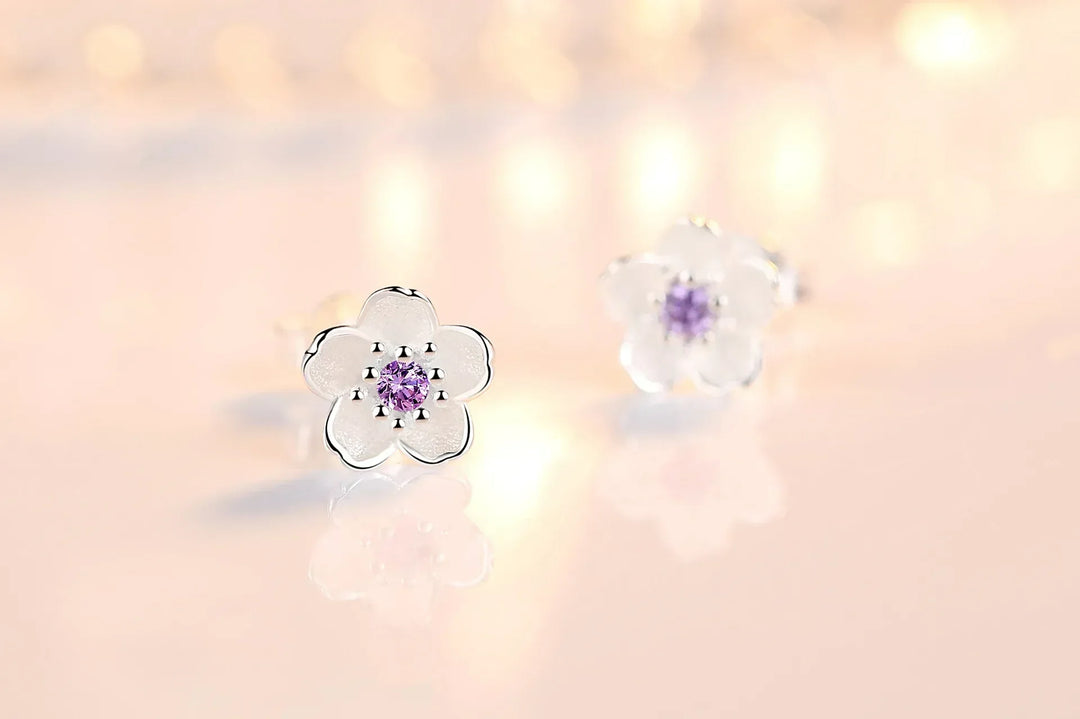 Orecchini a bottone con zirconia floreale