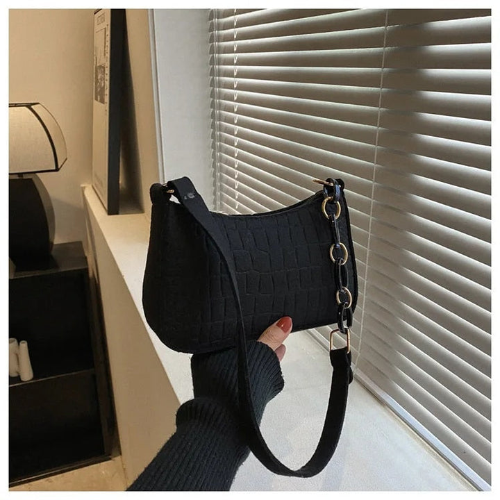 Magnella | Borsa a spalla elegante con design in rilievo coccodrillo