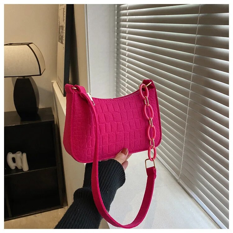 Magnella | Borsa a spalla elegante con design in rilievo coccodrillo