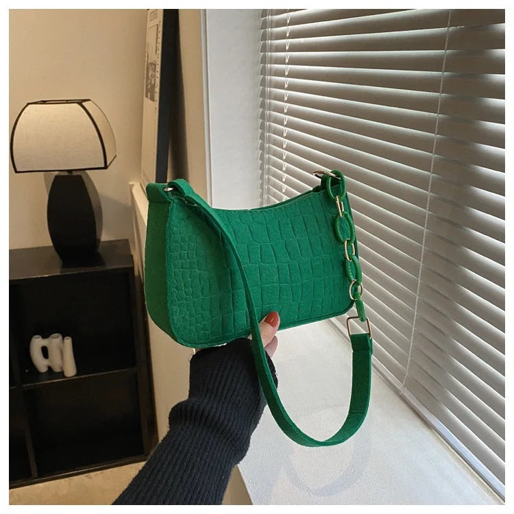 Magnella | Borsa a spalla elegante con design in rilievo coccodrillo
