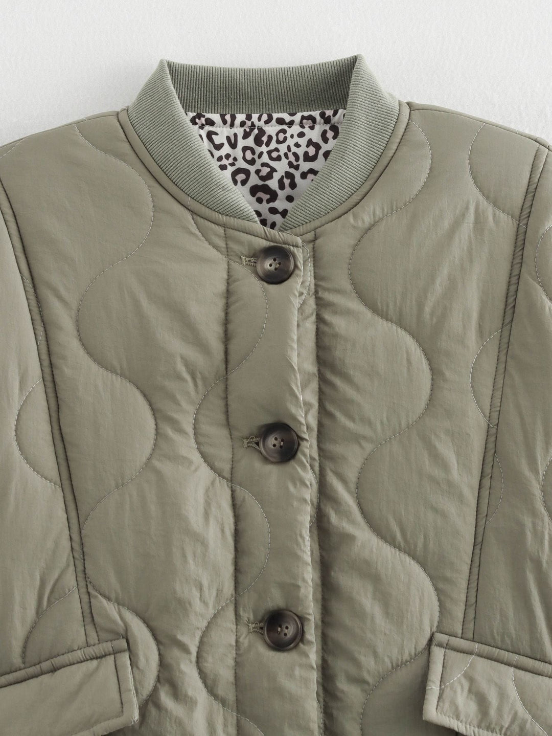 Nika™ | Cappotto con fodera a stampa leopardata